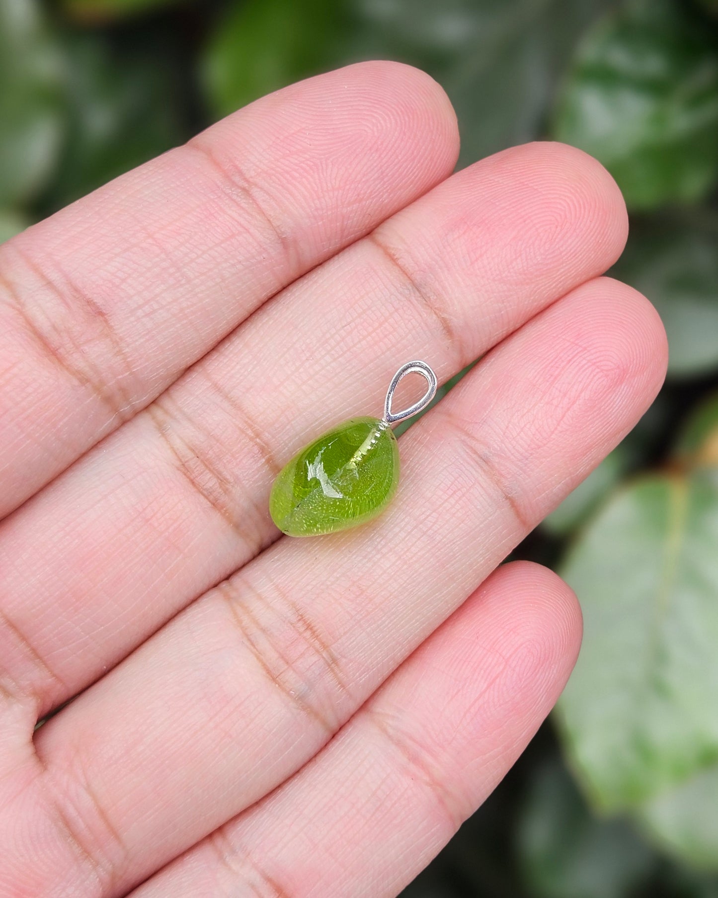 Freeform Peridot Pendant Saga